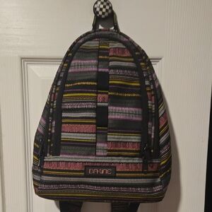Dakine Cosmo Pink, Yellow, Black And Grey Striped Backpack. 6.5 L